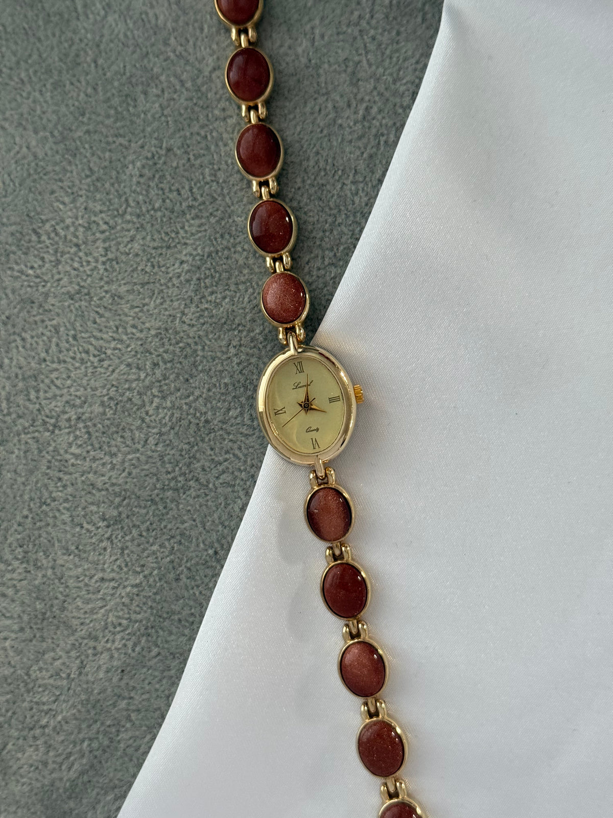 Vintage Gold Watch with Burgundy Oval Gem Bracelet