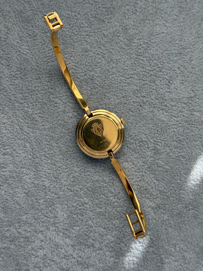 Vintage 1100L Gucci Watch with 12 Interchangeable Bezels