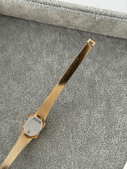 1990’s Ruby & Diamond Bezel Watch