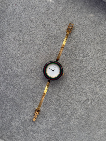 Vintage 1100L Gucci Watch with 13 Interchangeable Bezels