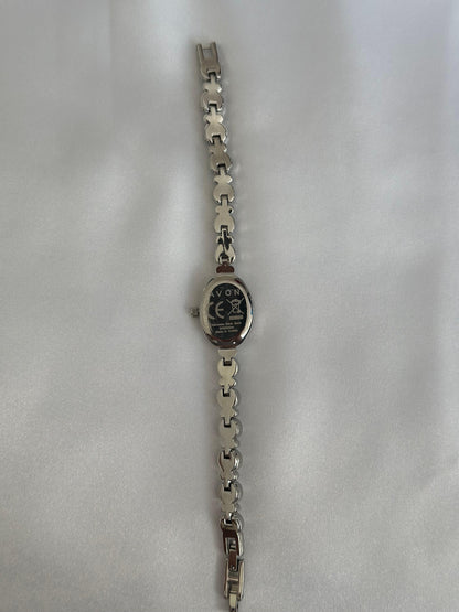 Montre vintage en argent avec perles