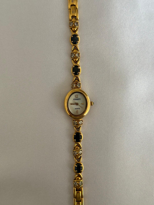 Montre à pierres précieuses vintage rare