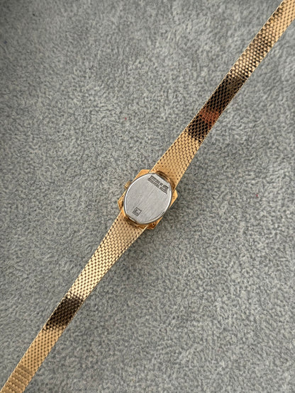 1990’s Ruby & Diamond Bezel Watch